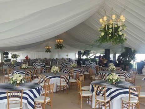 decor and design tent rental stripes chandelier reception dinner